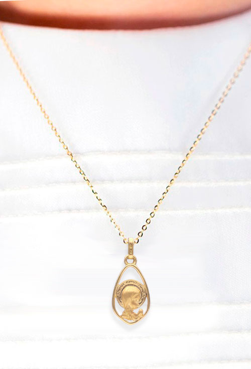 Medalla oro amarillo 18 kilates virgen niña forma de lagrima fotografia para exponer en nuestra web el rubi joyeros toma modelo