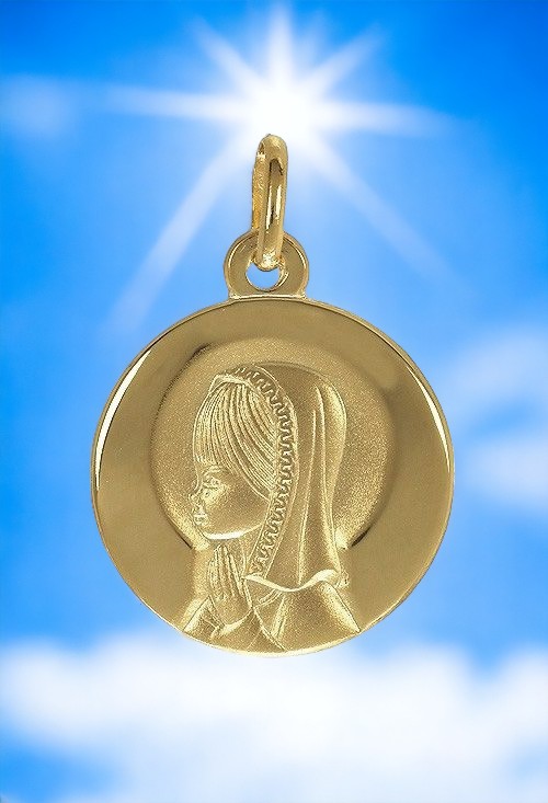 medalla de oro 18 ktes virgen niña toma redes sociales