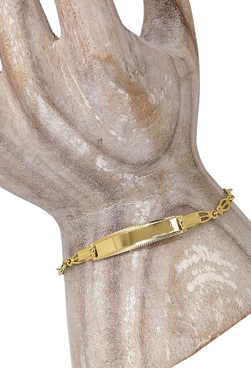 pulsera oro amarillo 18 kilates para comunion tiene chapa para grabar foto modelo mano 087_0055-121_04