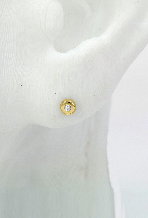 Pendientes tipo dormilonas de estilo chaton con circonita de oro amarillo de 18 kilates al mejor y mas barato precio de internet en nuestra joyeria online peto