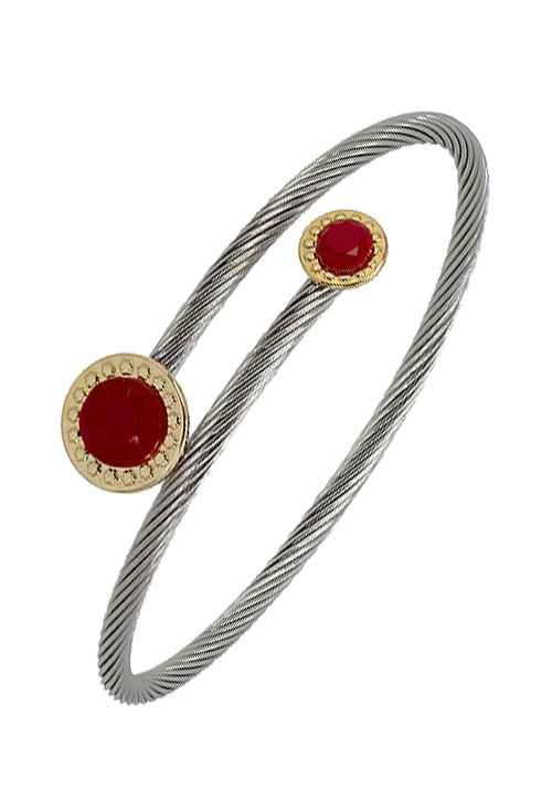 pulsera de acero y oro, aro rígido con terminales circulares de piedras rojas con bisel de oro