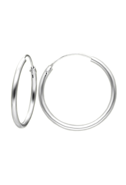 criolla de plata 18 mm de diámetro y 2 mm de grueso fotografia para joyeria online toma primera