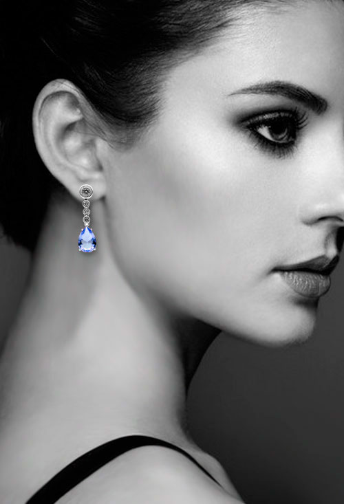 pendientes largos de plata con circonitas y simil aguamarina fotografia modelo para web el rubi joyeros