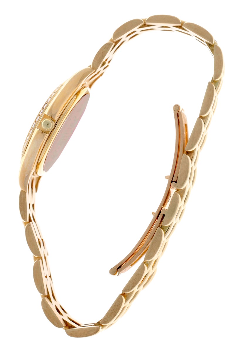 reloj para mujer oro 18 kilates y diamantes talla brillante marca Cyma fotografia lateral cierre oculto cerrado para exponer en la web el rubi joyeros