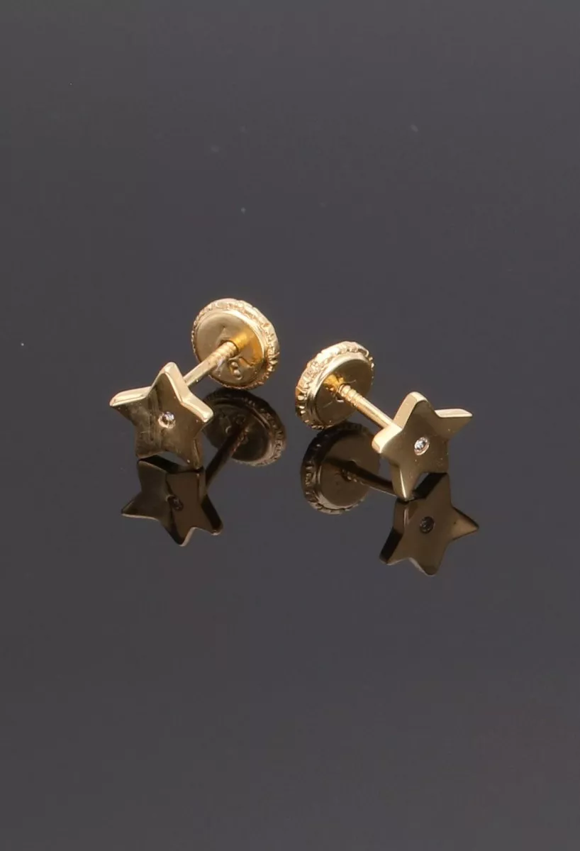 Pendientes para bebé oro amarillo 18k estrella con circonita 030_3471 fondo negro