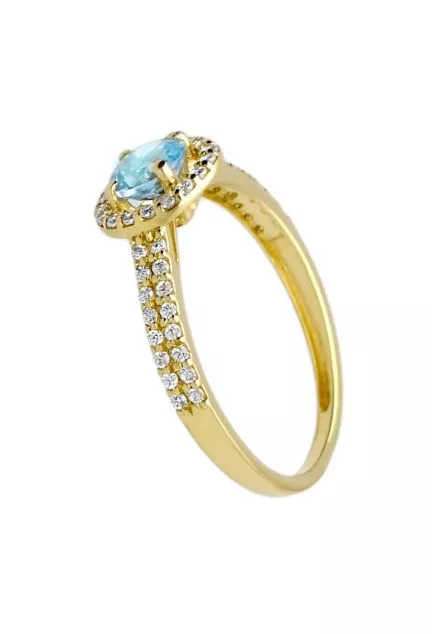 anillo oro amarillo 18 kilates con topacio azul rodeado de circonitas fotografia lateral