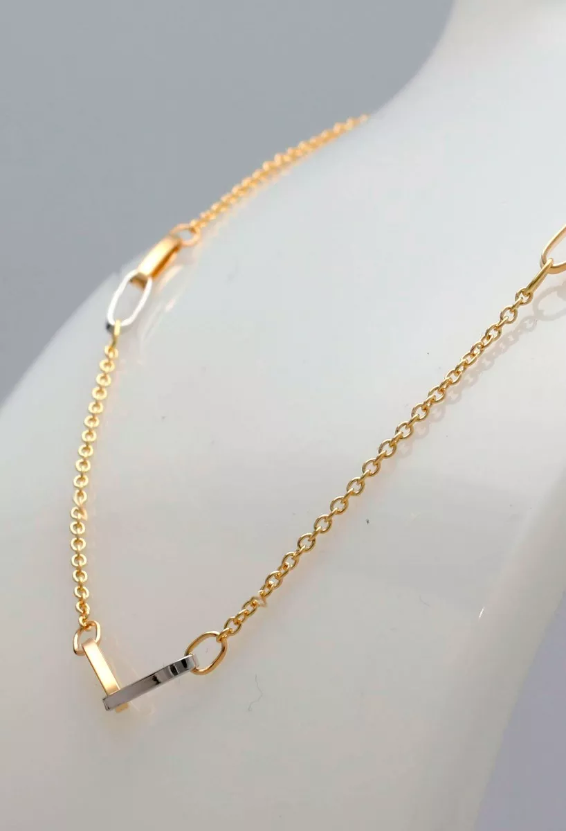 gargantilla oro bicolor 18 ktes cadena eslabones forzados y entrepiezas asas enlazadas vista en peto