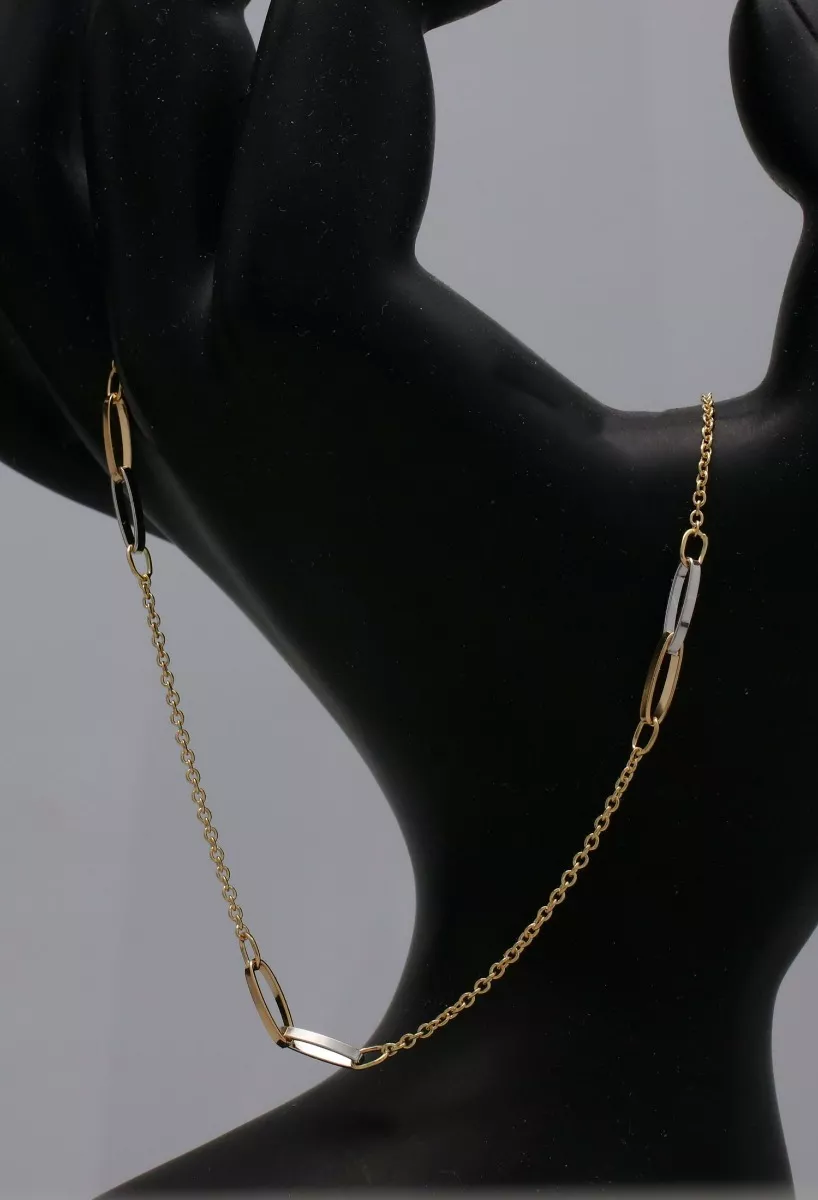 gargantilla oro bicolor 18 ktes cadena eslabones forzados y entrepiezas asas enlazadas vista en peto de joyeria
