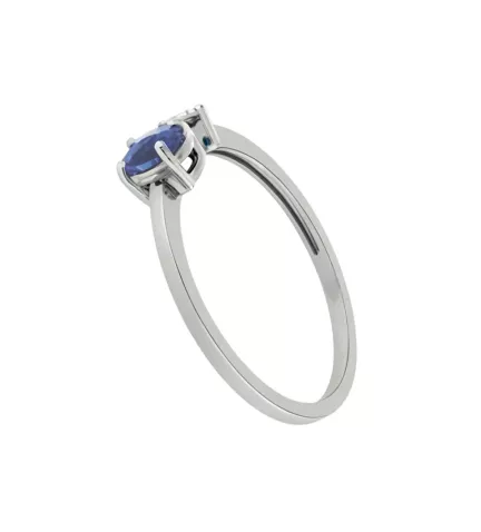 anillo de oro blanco con zafiro y diamantes anochecer azul vista de lado