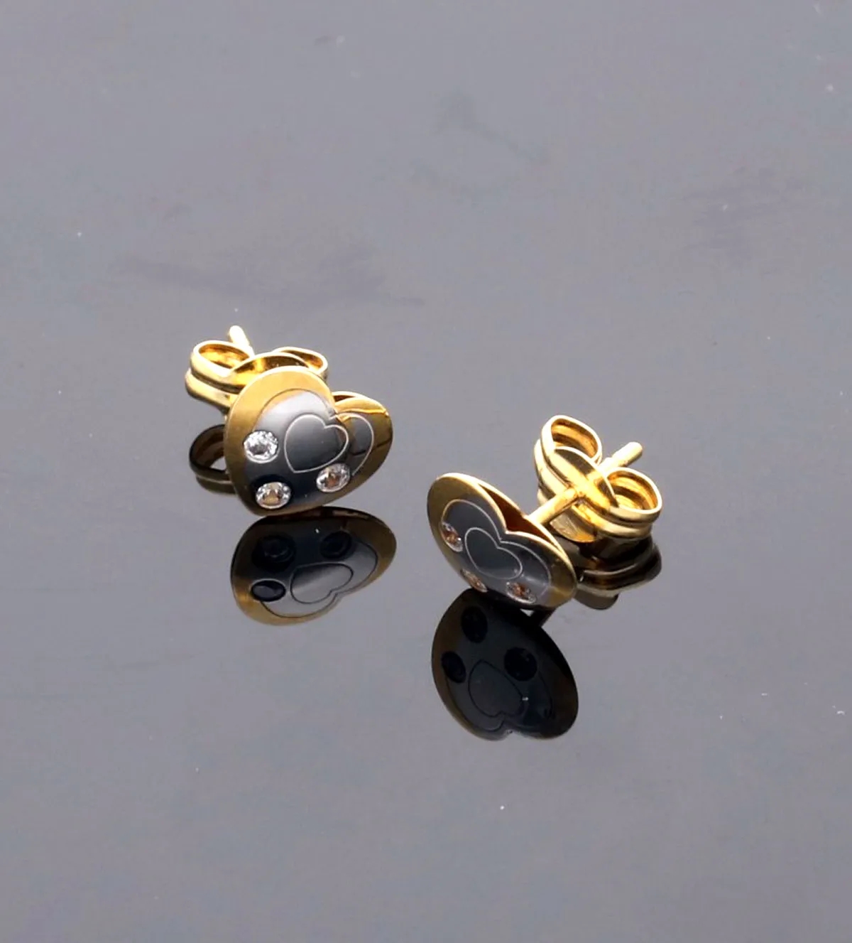 pendientes-de-oro-bicolor-18-ktes-corazones-243_613-00286 sin retoque