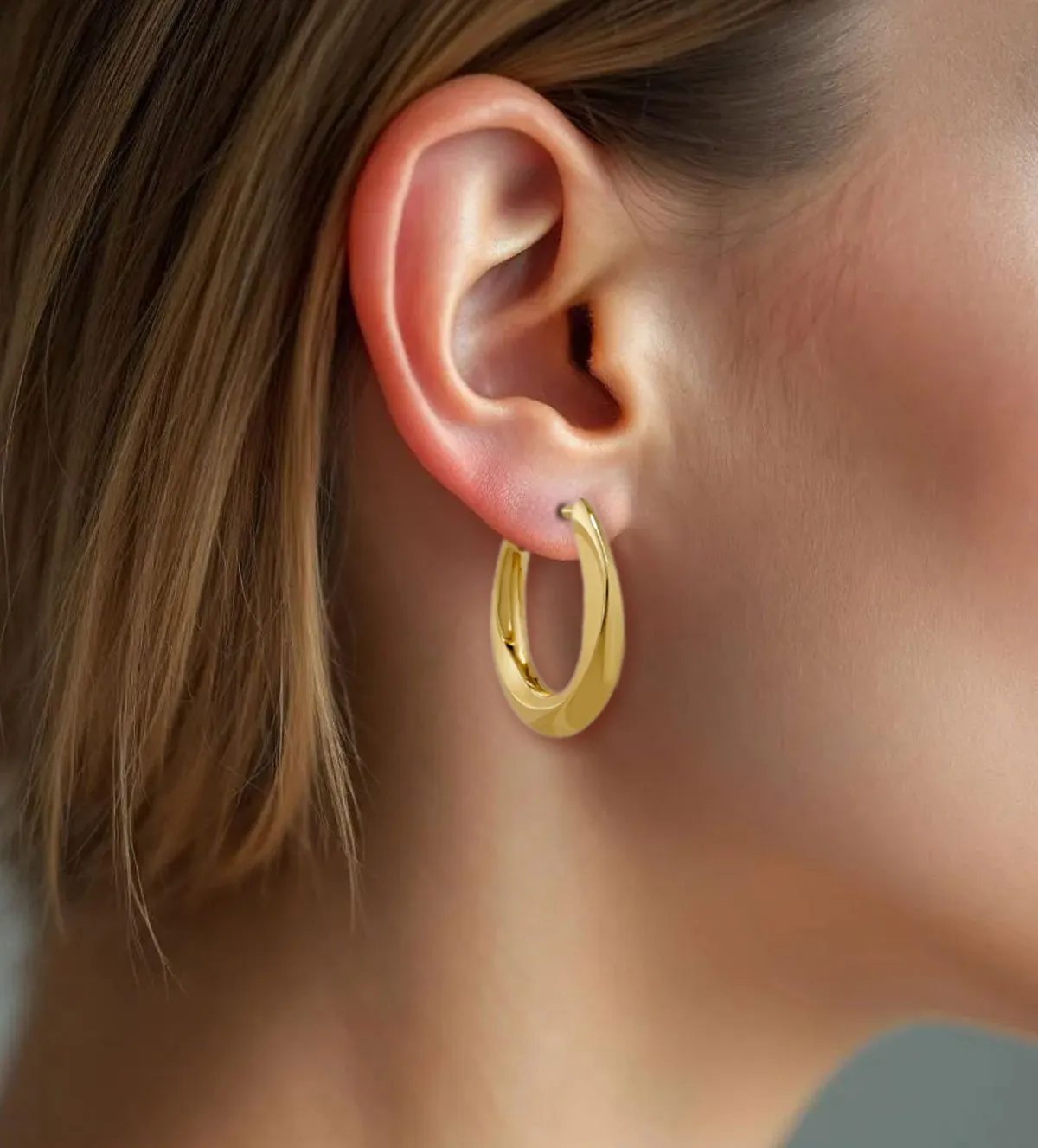 pendientes-de-oro-criollas-ovaladas-243_461-00519 modelo IA